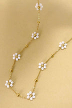 JOSSLYN by wall to wall - Daisy Beaded Flower Necklace by JOSSLYN by wall to wall