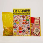 Match Made in Heaven 1000-Piece Puzzle: collage of colorful vintage matchbooks with diverse graphic designs.